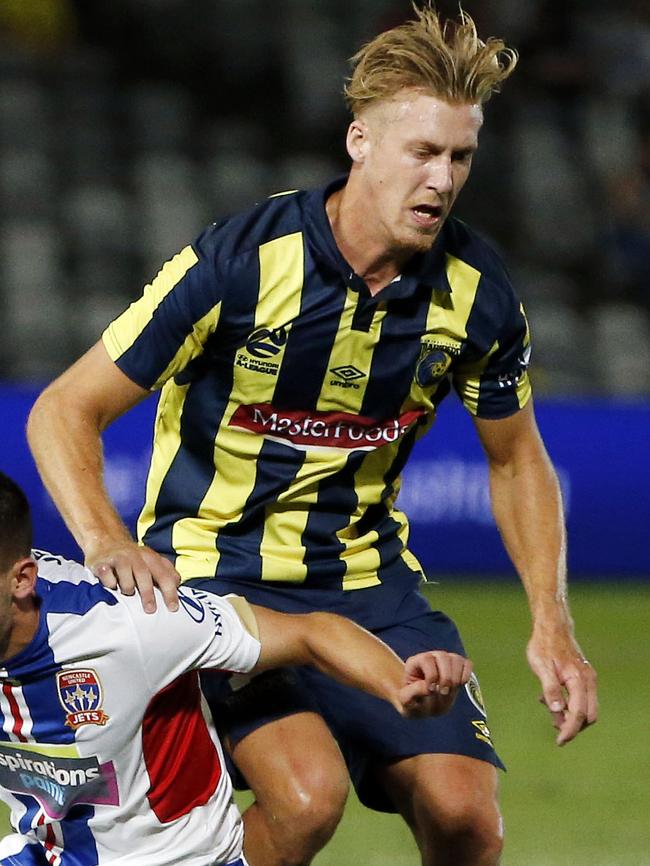 Josh Bingham in action for Central Coast Mariners.