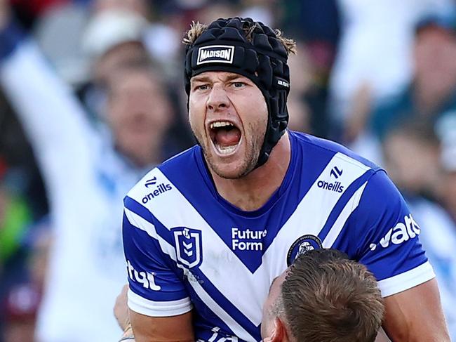 CANBERRA, AUSTRALIA - MAY 10: Matt Burton of the Bulldogs celebrates a try by team mateMax King during the round 10 NRL match between Canberra Raiders and Canterbury Bulldogs at GIO Stadium, on May 10, 2025, in Canberra, Australia. (Photo by Mark Nolan/Getty Images)