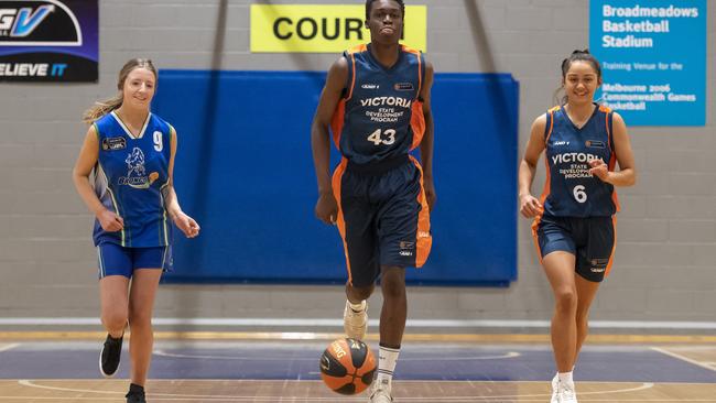 Eliza Ogilvie, AJ Magbegor and Casey Valenti-Paea at Broadmeadows Basketball stadium. Picture: Andy Brownbill