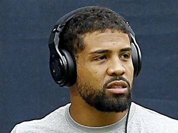 HOUSTON, TX - NOVEMBER 30: Arian Foster #23 of the Houston Texans stretches before playing the Tennessee Titans in a NFL game on November 30, 2014 at NRG Stadium in Houston, Texas. Bob Levey/Getty Images/AFP == FOR NEWSPAPERS, INTERNET, TELCOS & TELEVISION USE ONLY ==