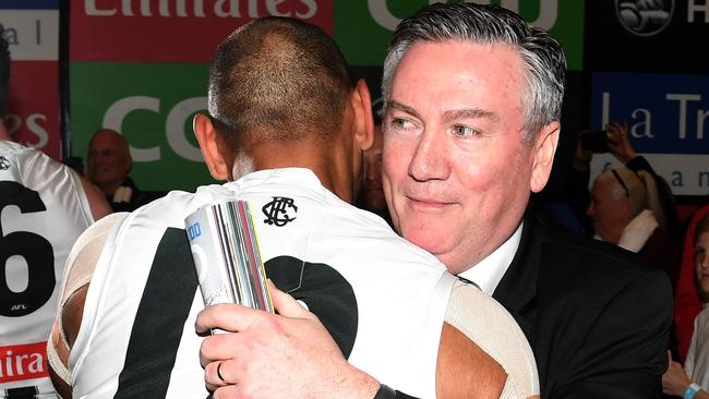 Eddie McGuire embraces Travis Varcoe on Friday night. Picture: AAP Images