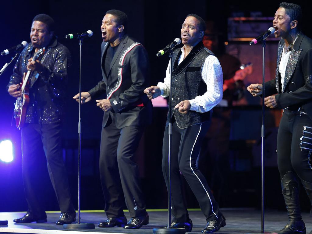 From left to right: Tito, Jackie, Marlon and Jermaine perform at the Monte Carlo Summer Festival in Monaco in 2014. Picture: VALERY HACHE / AFP