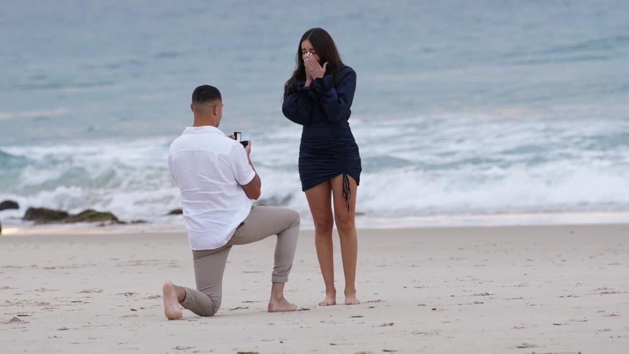 Rabbitohs star Braidon Burns, proposes to his partner Tiannan Pennini at Coolangatta Beach. They are now having a baby. Pic: Sunny Brar