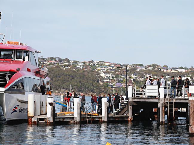 Commuters on Wharf 3 in 2017, waiting for a ferry to Barangaroo. Picture: Adam Yip / Manly Daily