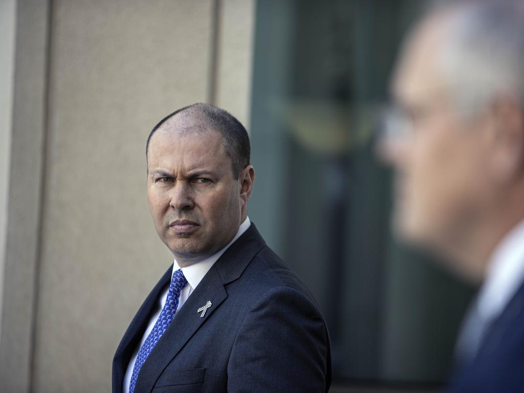 Treasurer Josh Frydenberg looks on at Prime Minister Scott Morrison during a press conference at Parliament House in Canberra Picture: NCA NewsWire/Gary Ramage