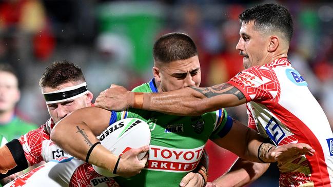 Trey Mooney of the Raiders takes on the defence during the round 13 NRL match between Dolphins and Canberra Raiders at Suncorp Stadium, on June 01, 2024, in Brisbane, Australia. (Photo by Bradley Kanaris/Getty Images)