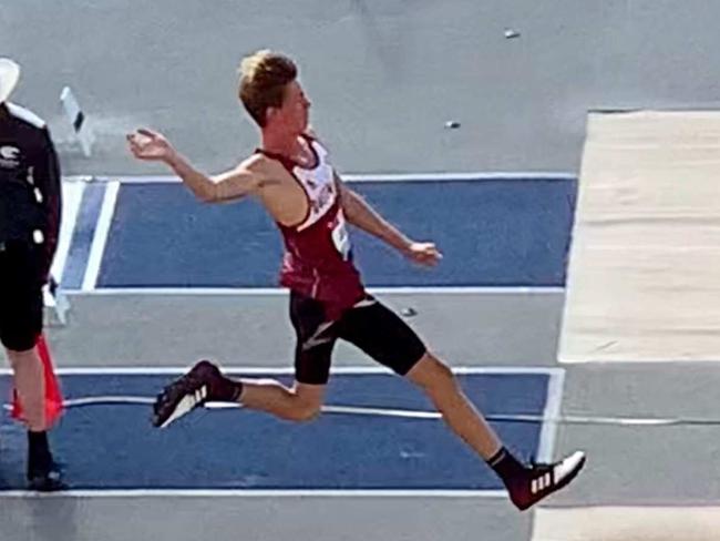 Jasinski in action in the long jump.