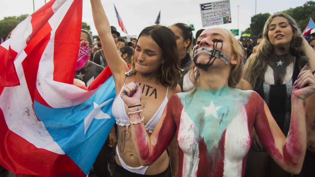 Young women photographed at the protest. Picture: Getty