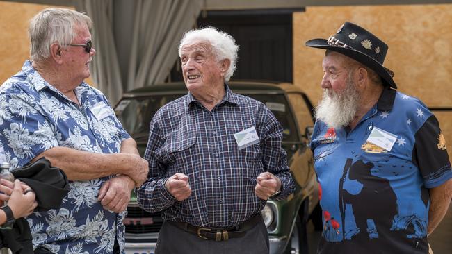 Survivors of the Tasman Bridge disaster: Lawrence Boxhall (left) and David Archer (right) chatting to Frank Manley (centre). Picture: Caroline Tan