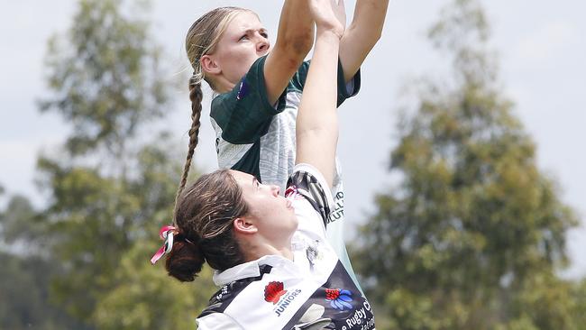 Danielle Seckold at the top of the lineout for Cook Islands in the U18s match against the Barbarians at Whalan. Picture: John Appleyard