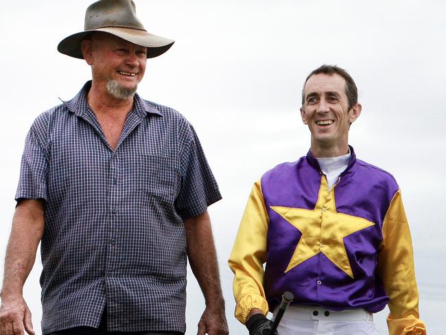 Far North QLD is experiencing a major shortage of jockeys in, with some trainers unable to race their horses on race days because there is no one to ride them. Trainer John Rowan and Jockey Kirk Stone inspect the track at Cannon Park.