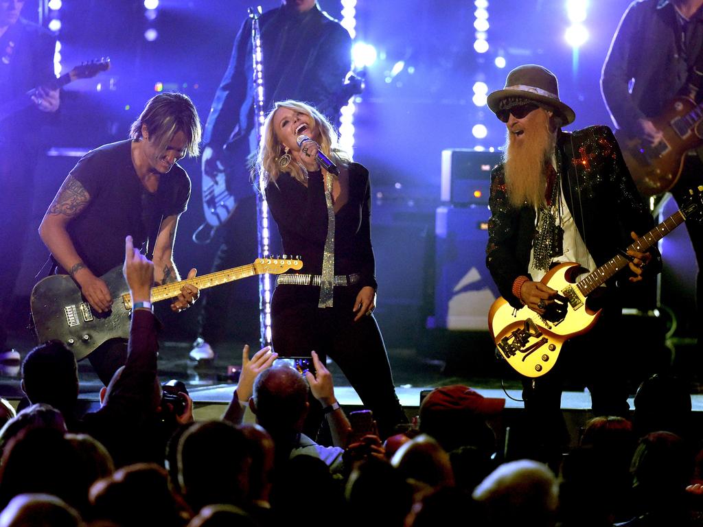 Keith Urban, Miranda Lambert and Billy Gibbons perform onstage during the 51st Academy of Country Music Awards. Picture: Getty