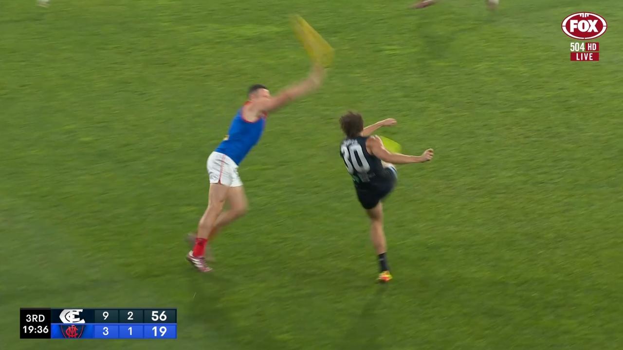 Steven May was adamant he touched this kick from Charlie Curnow. Credit: Fox Footy