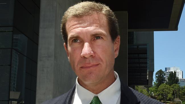 Former Billabong boss Matthew Perrin as he leaves the District Court in Brisbane. (AAP Image/Dan Peled)