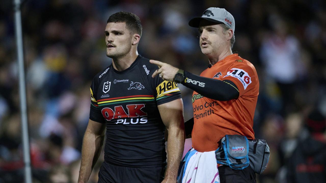 PENRITH, AUSTRALIA - JUNE 04: Nathan Cleary of the Panthers is assisted from the field with an injury during the round 14 NRL match between Penrith Panthers and St George Illawarra Dragons at BlueBet Stadium on June 04, 2023 in Penrith, Australia. (Photo by Brett Hemmings/Getty Images)