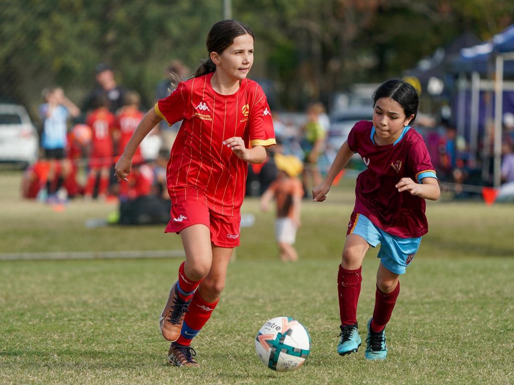 Junior footballer Tess Neary (11) of Estates FC, Townsville. Picture: Supplied.