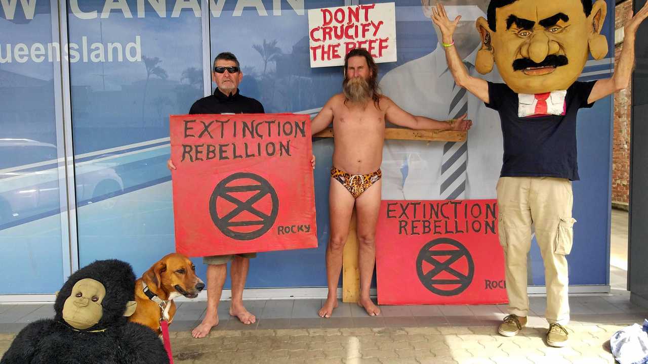 Sunny dog, Chris Hooper, Chris Houghton and Graeme Dunstan protesting in front of Senator Matt Canavan's office.. Picture: Contributed