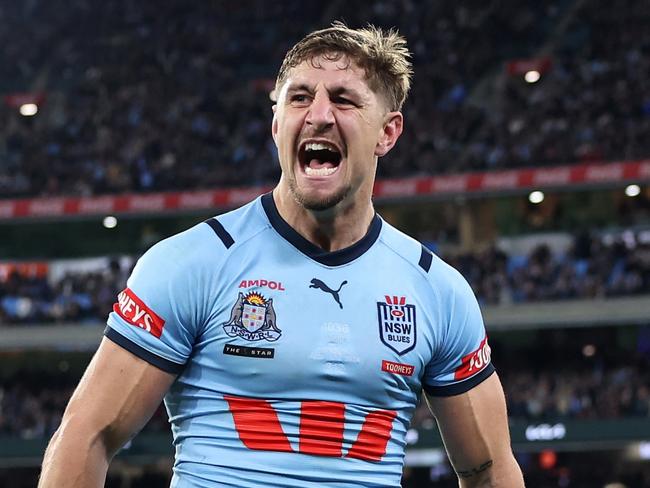 MELBOURNE, AUSTRALIA – JUNE 26: Zac Lomax of the Blues celebrates after scoring a try during game two of the men's State of Origin series between New South Wales Blues and Queensland Maroons at the Melbourne Cricket Ground on June 26, 2024 in Melbourne, Australia. (Photo by Cameron Spencer/Getty Images)