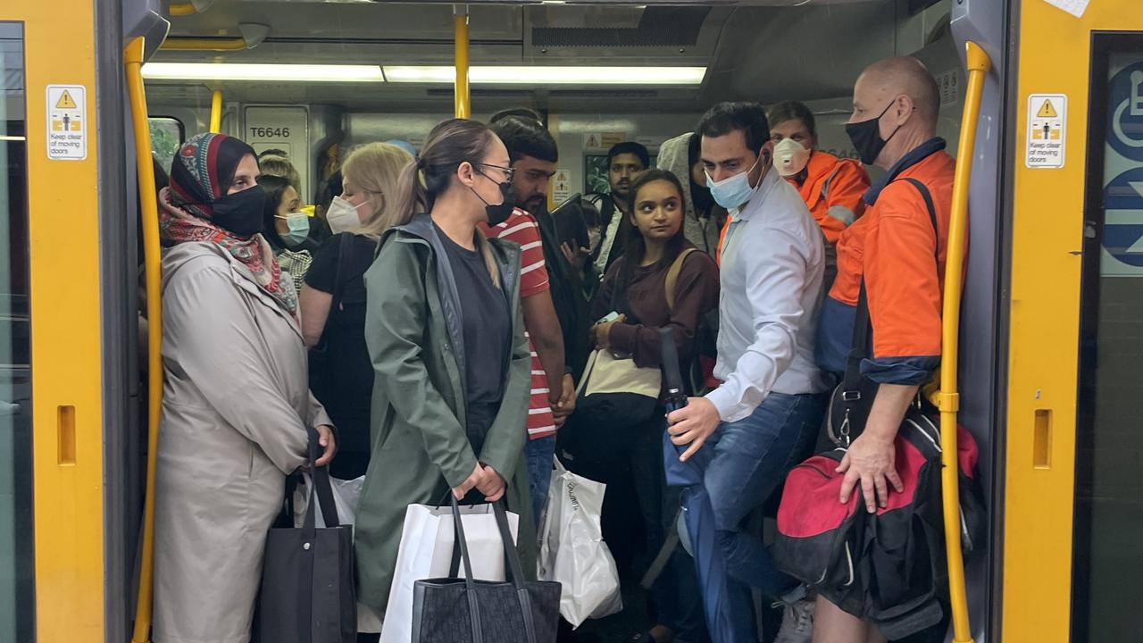 Train commuters at Wentworthville train station on Tuesday evening when major delays and cancellations were imposed across the network.