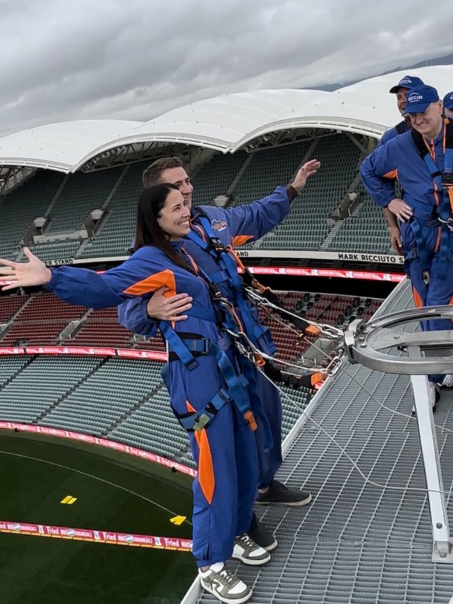 Candice Blasl and husband Troy Henderson on the roof of Adelaide Oval. Picture: Nova