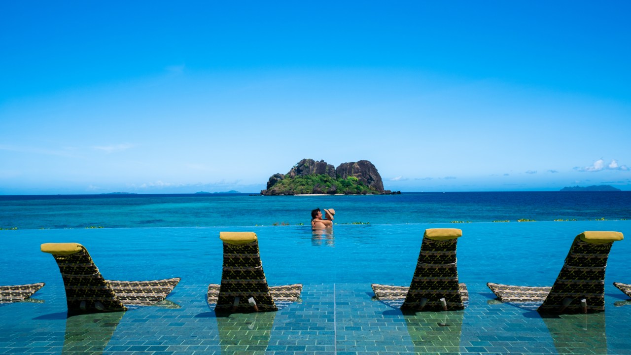 <h2><span>Vomo Island</span></h2><p><span>You know that a hotel&rsquo;s all-inclusive package lives up to the promise when a daily wash and fold laundry service is just part of the service. At this slice of paradise, you not only get all meals and non-alcoholic beverages, they&rsquo;ll throw in wi-fi, non motorised watersports, free access to the tennis courts and the 9-hole pitch and putt golf course. Perfect for those who like an active holiday. Picture: </span>Brook &amp; Radha Sabin/Fiji Tourism.</p><p class="button-common"><a title="https://travel.escape.com.au/accommodation/detail/vomo-island-resort?HotelCode=03290435" href="https://travel.escape.com.au/accommodation/detail/vomo-island-resort?HotelCode=03290435" target="_blank" data-cta="https://travel.escape.com.au/accommodation/detail/vomo-island-resort?HotelCode=03290435" data-editable="true">Book here</a></p>