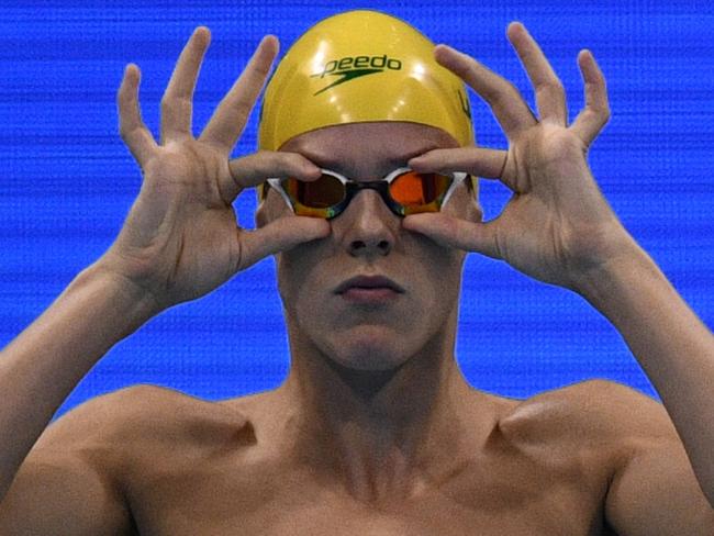 Australia's Mitchell Larkin prepares to compete in a Men's 200m Backstroke heat during the swimming event at the Rio 2016 Olympic Games at the Olympic Aquatics Stadium in Rio de Janeiro on August 10, 2016. / AFP PHOTO / Martin BUREAU
