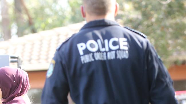 Police at unit 11 no 65 Chiswick rd Greenacre  after they raided it in the early hours looking for evidence in terror related activities .picture John Grainger