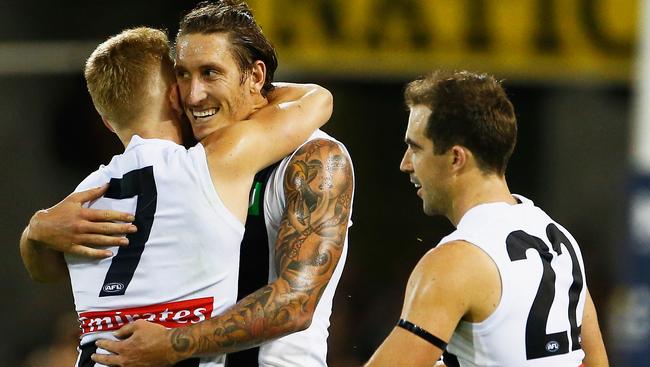 New Glenelg recruit Jesse White celebrates a goal with his former Collingwood teammates. Picture: Jason O'Brien (Getty Images).