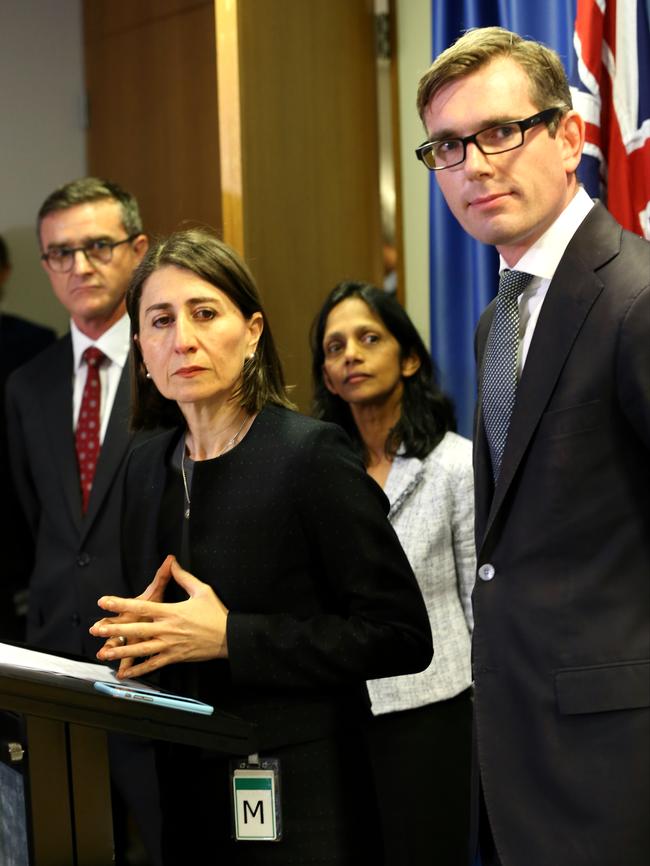 Premier Gladys Berejiklian and Treasurer Dominic Perrottet announce the sale of Endeavour Energy. Picture: Stephen Cooper