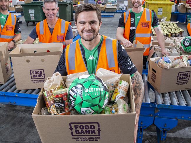 Former radio host Matt Tilley is hosting a warehouse food packing session for charity Foodbank with A-League soccer players Andrew Durante, Brendan Hamill, Dylan Pierias and Josh Risdon.Picture by Wayne Taylor 20th May 2020