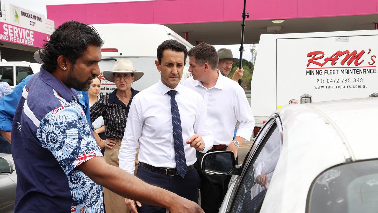 Leader of the Opposition David Crisafulli talks with Ram’s Motor Repairs Managing Director Vishal Nand about repeated youth crime damage to vehicles at his store. Picture: Liam Kidston