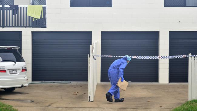 Police collect evidence from the scene of a fatal stabbing in Pimlico. PICTURE: MATT TAYLOR.