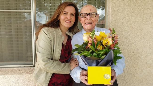 Bankstown state Labor MP Tania Mihailuk presented Albert Maurice Collins flowers for his 104th birthday.