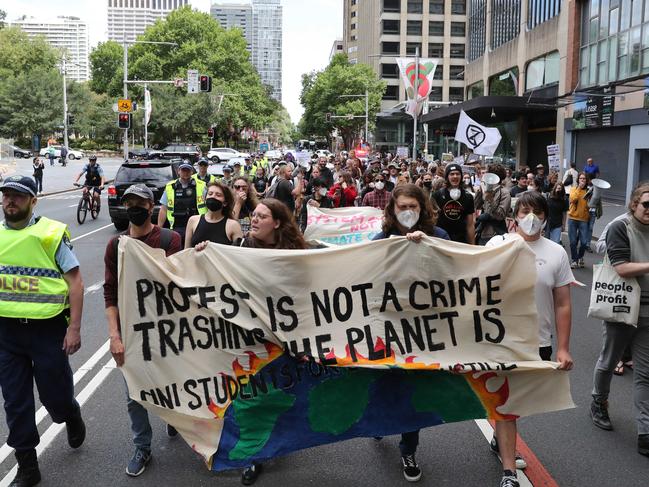 SYDNEY, AUSTRALIA - NewsWire Photos DECEMBER 17, 2022: Environmental Protesters marched form Town Hall to the NSW Parliament to demanding an end to the Anti-Protest laws. Picture: NCA NewsWire / David Swift