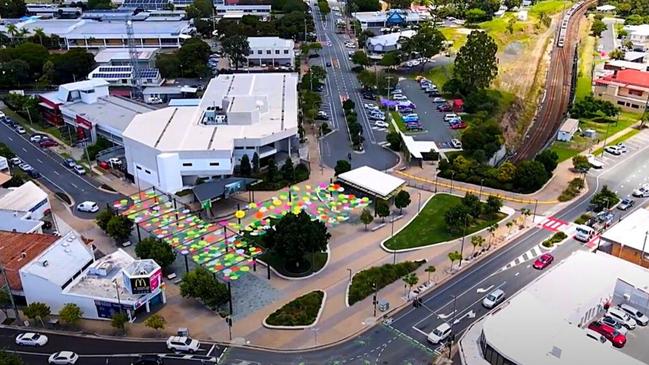 An aerial artist view of the Beenleigh Town Square and James St where the state government has told landowners it will resume their land to make way for a new train station for the Kuraby to Gold Coast Faster Rail project.