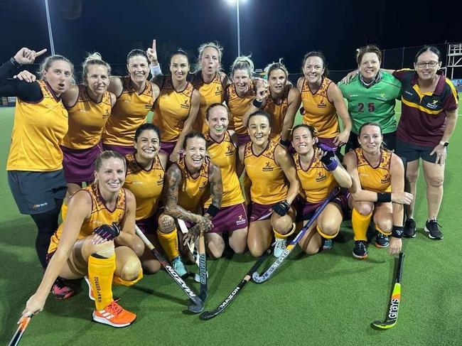 Coach Lisa Morgan with the Queensland Masters over-34 women's team that won the national title.