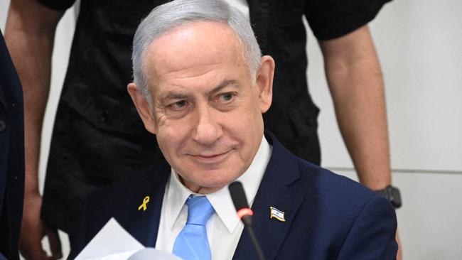 Israeli Prime Minister Benjamin Netanyahu attends his trial on corruption charges at the district court in Tel Aviv, on March 12, 2025. (Photo by Yair Sagi / POOL / AFP)