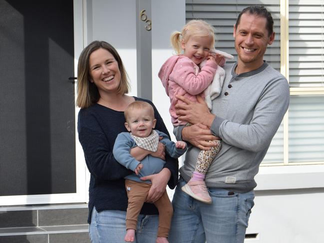 Cameron and Samantha Hobbs from Dee Why, with children Marlise, three, and Theodore, 18 months. They have halved their energy costs by installing solar panels.