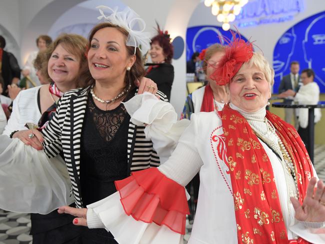 The Italian Ladies Choir start the party early at the Lavazza Marquee. Picture: AAP Image/Tracey Nearmy