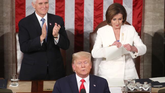 House Speaker Nancy Pelosi rips up pages of the State of the Union speech at the end of President Trump’s address. Picture: AFP