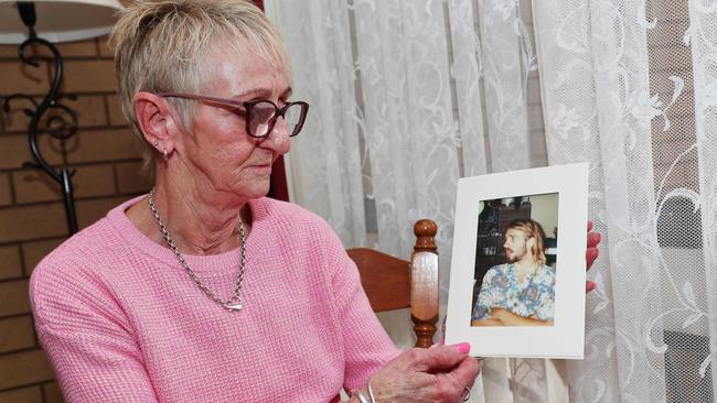 Pamela Tascas with a picture of Trevor when he was 19. For 16 years Pamela Tascas has been plagued by the disappearance and suspected murder of her son Trevor. Now police are releasing a $1m reward to solve his disappearance. Picture: Alan Barber