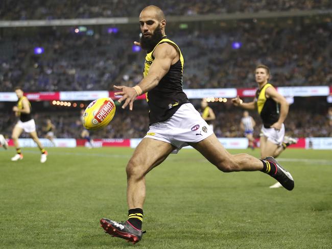 MELBOURNE, AUSTRALIA - MAY 31: Bachar Houli of the Tigers kicks the ball during the 2019 AFL round 11 match between the North Melbourne Kangaroos and the Richmond Tigers at Marvel Stadium on May 31, 2019 in Melbourne, Australia. (Photo by Dylan Burns/AFL Photos)