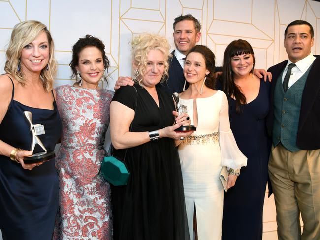 The cast of Wentworth pose for a photograph after winning a Logie for Most Outstanding Drama Series. Picture: AAP