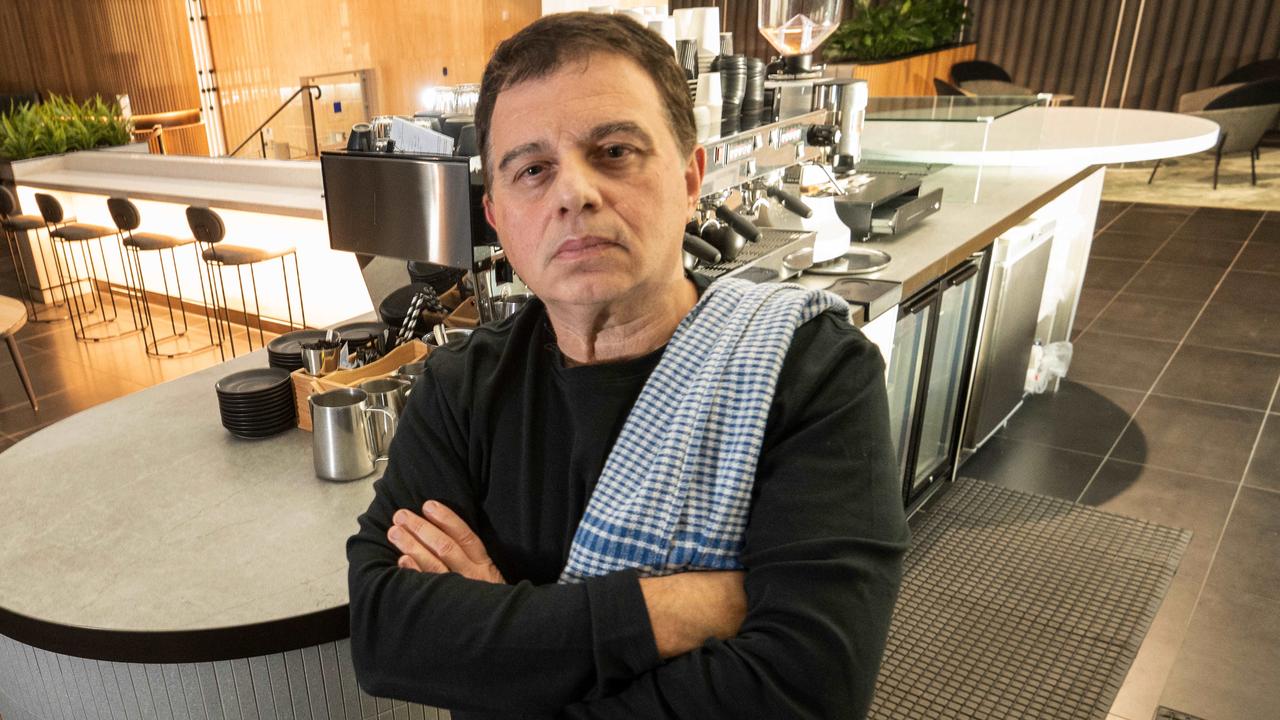 Cafe owner Spiros Rombotis is angry public servants are still not returning to the CBD offices. Picture: Tony Gough