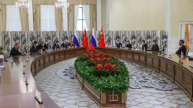 Keeping their distance … Russia’s Vladimir Putin, far left, holds talks with his Chinese counterpart Xi Jinping, far right, in the Uzbek city of Samarkand. Picture: AFP