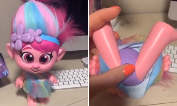 trolls doll with button on private area