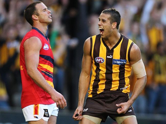 Lance Franklin celebrates the win with Kris Massie devastated. Picture: Michael Dodge 