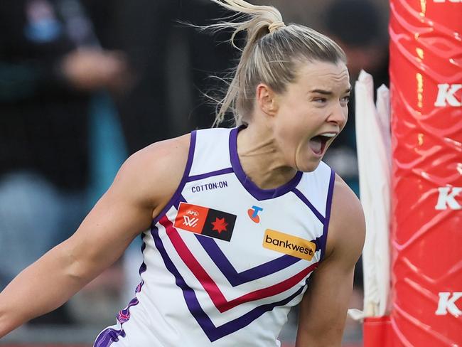 ADELAIDE, AUSTRALIA - SEPTEMBER 14: Hayley Miller of the Dockers celebrates a goal during the 2024 AFLW Round 03 match between the Port Adelaide Power and the Fremantle Dockers at Alberton Oval on September 14, 2024 in Adelaide, Australia. (Photo by James Elsby/AFL Photos via Getty Images)