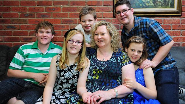 Lisa Gray, with her children Jordy, Josh, Mitch, Marnie and Shakira, has looked after more than 70 foster children. Picture: Leanne Kelly