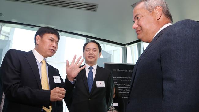 Songcheng Group Chairman Qiaoling Huang talks with Chinese Consul-General Dr Yongchen Zhao and Mayor Tom Tate. Picture Glenn Hampson